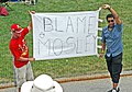 Disgruntled fans with a "Blame Mosley" banner during the race at the United States GP 2005.