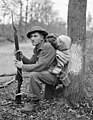 Private K.O. Earl of The Perth Regiment resting in the forest north of Arnhem, Netherlands, April 15, 1945