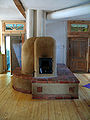 Claystove with a bench in a half-timbered house in Northern Germany