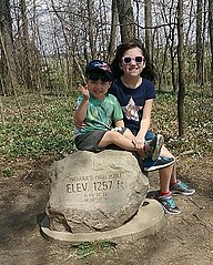 Visitors at Hoosier Hill, the highest point in Indiana