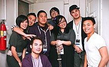 Photograph of Filipino American musicians – six men and two women