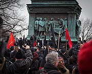 Anarchists usually use the black bloc strategy when protesting or rioting.