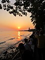 The sunset in front by the Long Pier of Tamsui