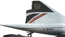 Rear end of aircraft G-BOAF, in BA livery with a large chunk missing. The tail-strike wheel is lowered.