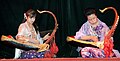 Image 26Two female musicians play the saung at a performance in Mandalay. (from Culture of Myanmar)