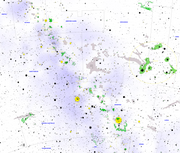 A starchart of the Galactic Center area, with the Rho Ophiuchi cloud complex marked as large green area in the middle of the right half of the chart.