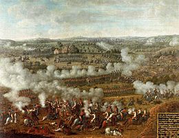 Painting of armies in formation exchanging musket fire across a hilly landscape.