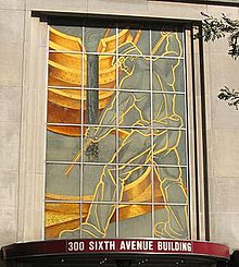 The Puddler, a glass mural of an iron or steel worker in downtown Pittsburgh