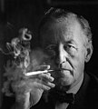 Ian Fleming, scriitor și jurnalist britanic, cunoscut pentru crearea personajului James Bond