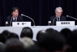 President of Fuji Television Koichi Minato (L) and Chairman Shuji Kano (R) hold a press conference at the company's headquarters in Tokyo on January 27, 2025. The chairman and president of Japan's Fuji Television resigned on January 27, weeks after a celebrity presenter and former pop star was accused of sexual assault. (Photo by Kazuhiro NOGI / AFP) (Photo by KAZUHIRO NOGI/AFP via Getty Images)