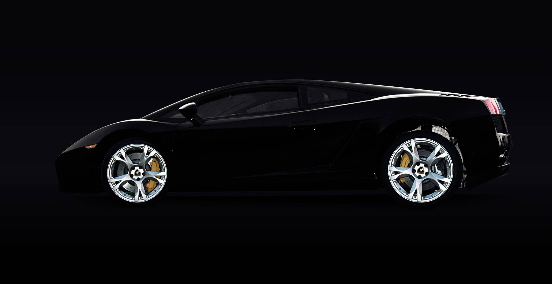 Schwarzer Lamborghini-Sportwagen in Studiolicht mit silbernen Felgen. — Schwarze Sportwagen Wallpaper