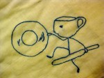 Hand-stitched dish towel.