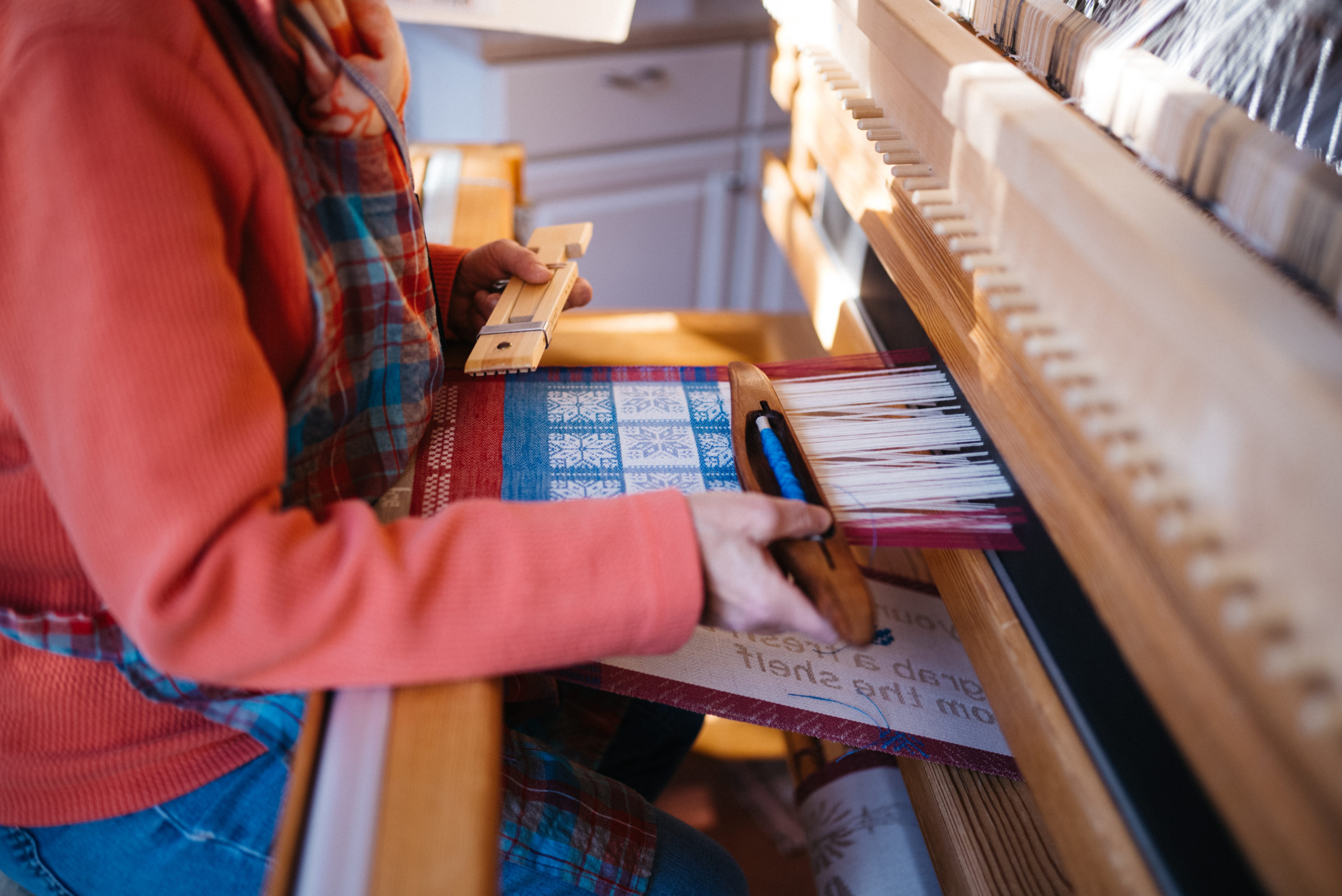 Drawloom weaving.