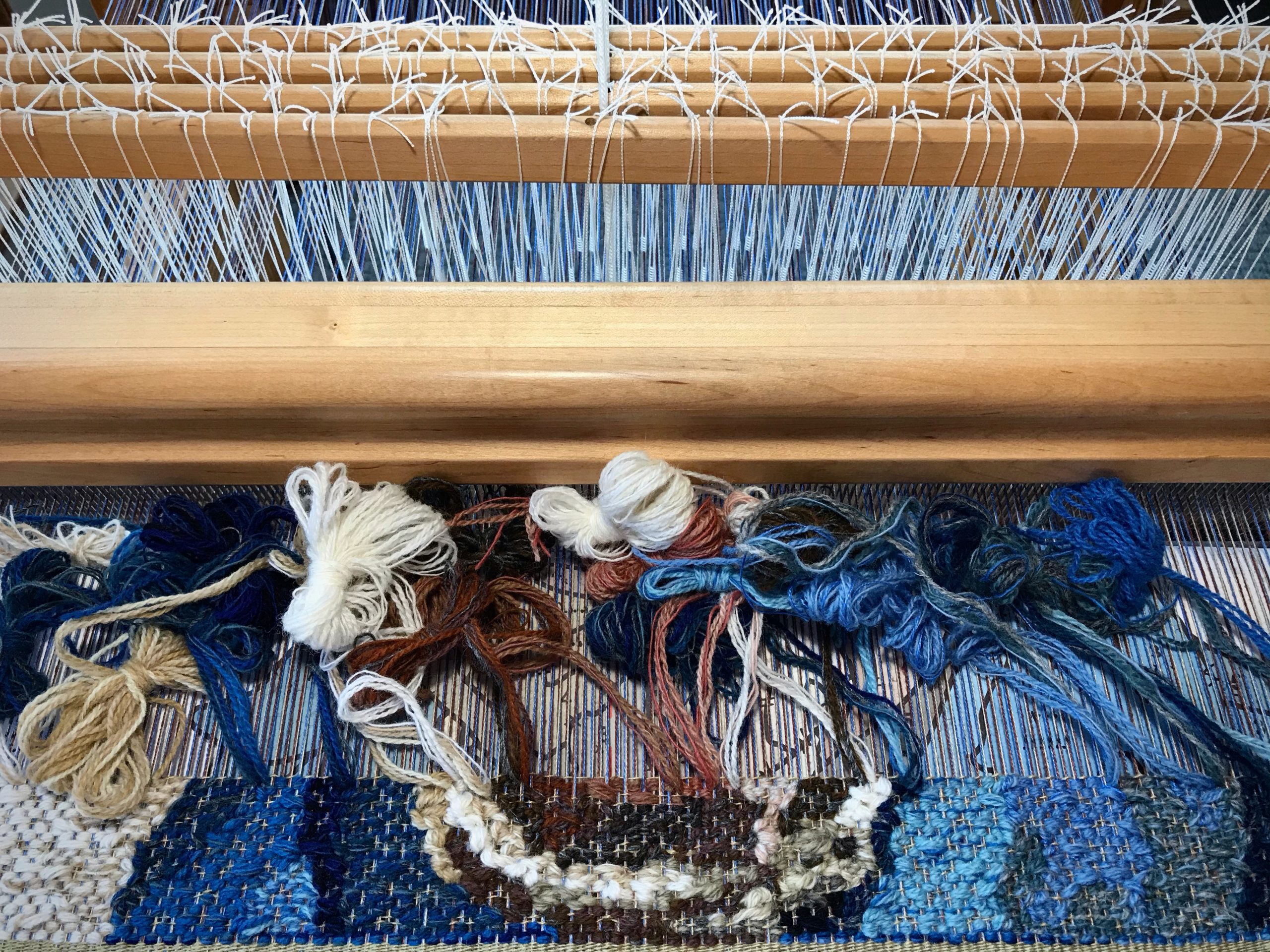Tapestry portrait in progress.