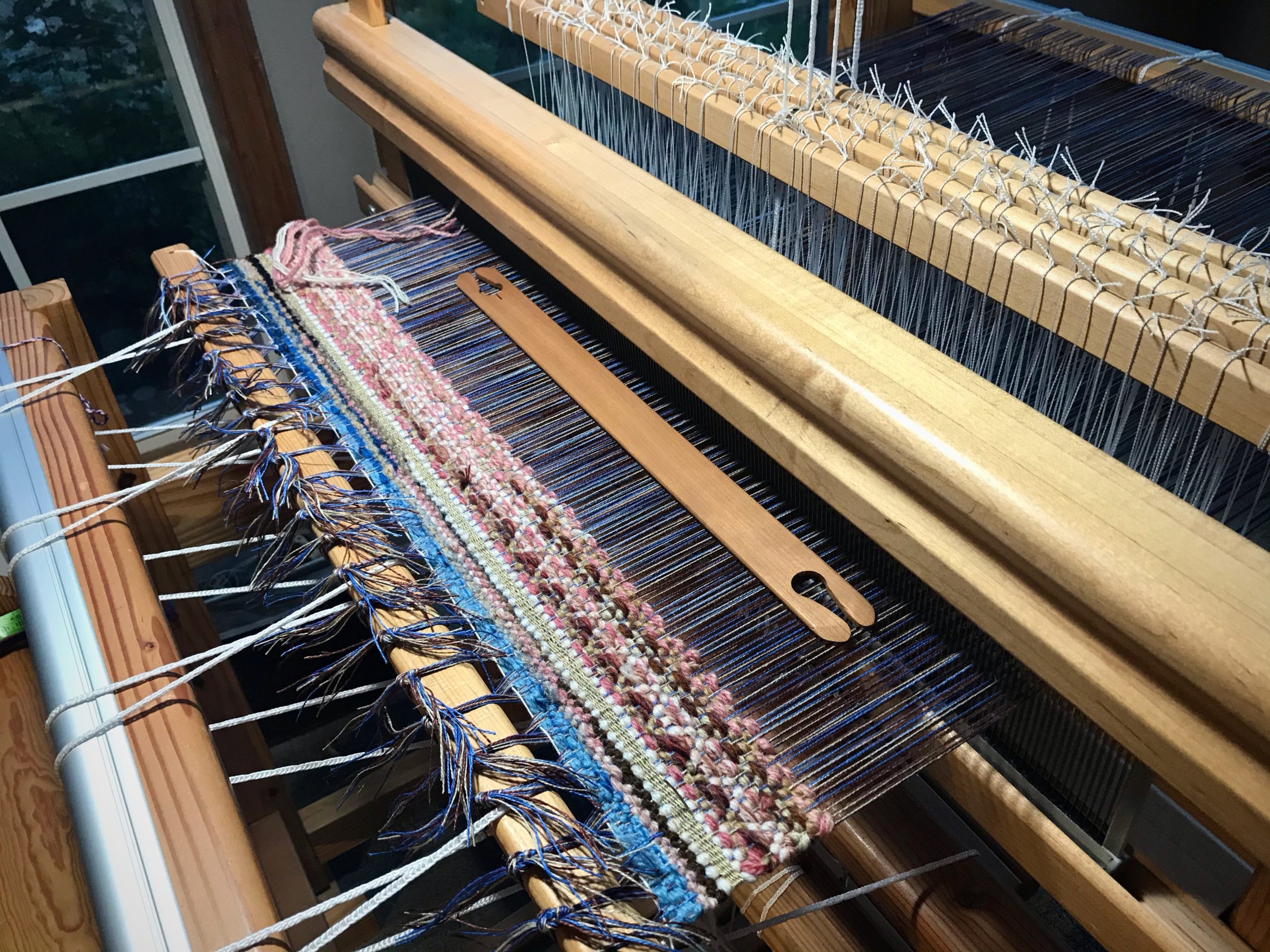 Linen warp and wool weft in rosepath.