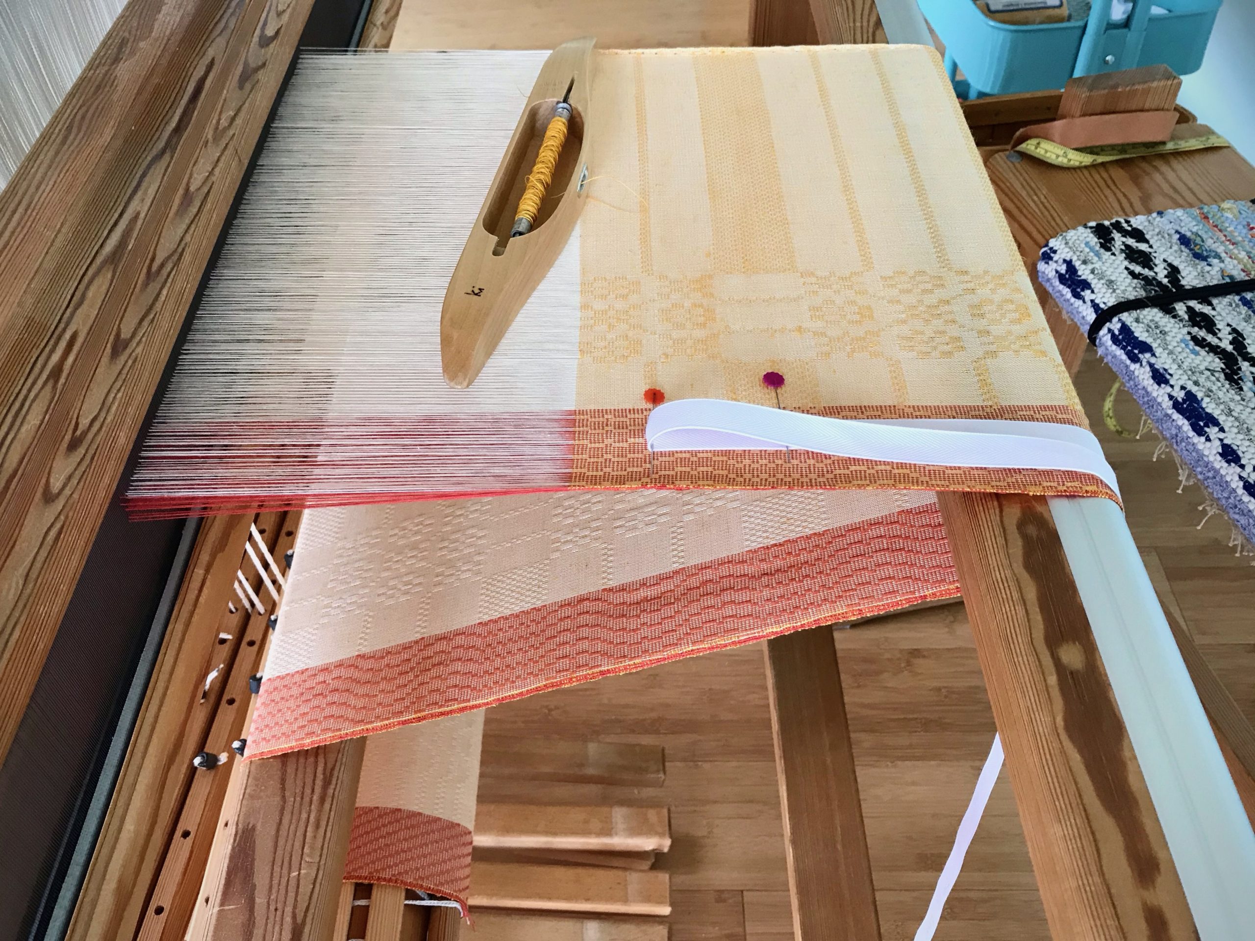 Weaving fabric for a 3-tiered skirt.