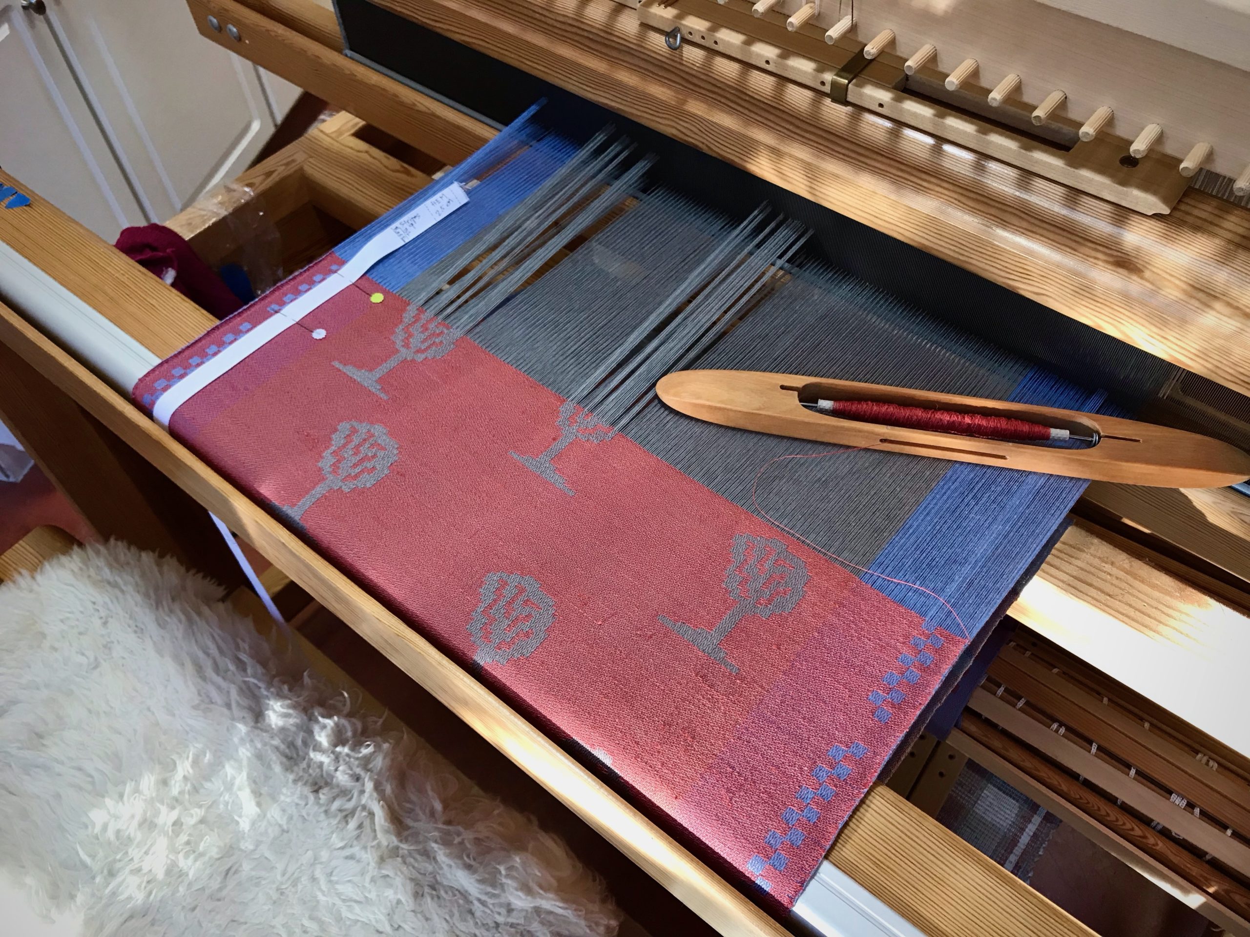 Weaving hand towels on the drawloom.