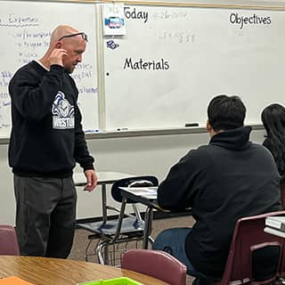 teacher on front of classroom