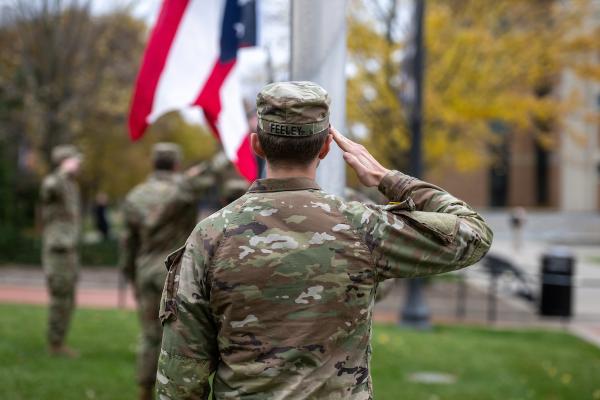 A Kent State University Army ROTC cadet salutes during the university’s 2023 Veterans Day Commemoration.