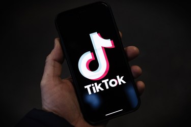 In this photo illustration, a TikTok logo is displayed on an iPhone on February 28, 2023 in London, England.