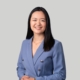 headshot of woman in blue blazer