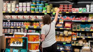 Be_Well-Calorie_Math_7_829 FILE – A customer looks at items at a Grocery Outlet store in Pleasanton, Calif.,. on Sept. 15, 2022. (AP Photo/Terry Chea, File)