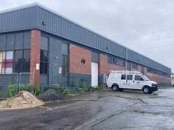 IMG_2368 The Newfield Avenue vacant warehouse in West Hartford that will house Tools Renewed this fall. (Don Stacom/The Hartford Courant)