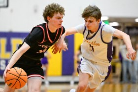 DCC-L-BBALL_2MJ1937 Fairview’s Luke Mangine, left, drives around Boulder’s Simon James, right, on Thursday, Jan. 15, 2026. (Matthew Jonas/Staff Photographer)