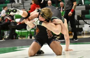 DCC-L-RegWrest3-2-14-01 Mead’s Liam Kelly wrestles against Niwot’s Eli Quesada in the 165-pound finals at the Class 4A Region 2 tournament Saturday at Niwot High School. (Alissa Noe/BoCoPreps.com)