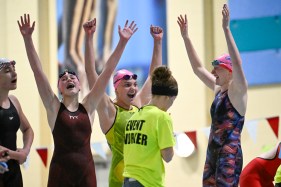 DCC-L-SWIM_2MJ9990 From left: Broomfield’s Marbury Wherry, Ellie Foulke and Ridley Hagerman cheer as Myra Wherry, not pictured, finishes the 400 yard freestyle relay event during the girls class 4A state swimming championship at the Veterans Memorial Aquatic Center in Thornton on Friday, Feb. 13, 2026. (Matthew Jonas/Staff Photographer)