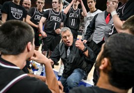 COLORADO STATE HIGH SCHOOL BASKETBALL Silver Creek coach Bob Banning huddles his team during Saturday's game at the Denver Coliseum. (AAron Ontiveroz/The Denver Post)