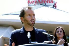 Live_Nation_Antitrust_Trial_44351 FILE- Michael Rapino, President and CEO of Live Nation Entertainment, speaks during a news conference in Seattle on June 7, 2017. (AP Photo/Ted S. Warren, File)