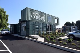 REG-L-TwinValleyCoffee746 Corrugated metal building designed from shipping containers serves as new drive-thru location for Twin Valley Coffee.