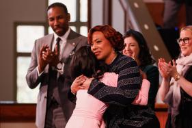 Redemption_Bank_King_Card_4_162-1 FILE – Bernice A. King, facing forward, hugs Siara White after her tribute to Coretta Scott King during the Martin Luther King Jr. Beloved Community Commemorative Service at Ebenezer Baptist Church in Atlanta, Jan. 19, 2026. (Abbey Cutrer/Atlanta Journal-Constitution via AP, File)