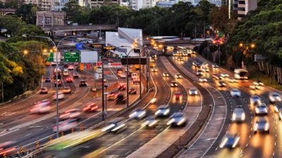 Busy freeway and tollway at dusk