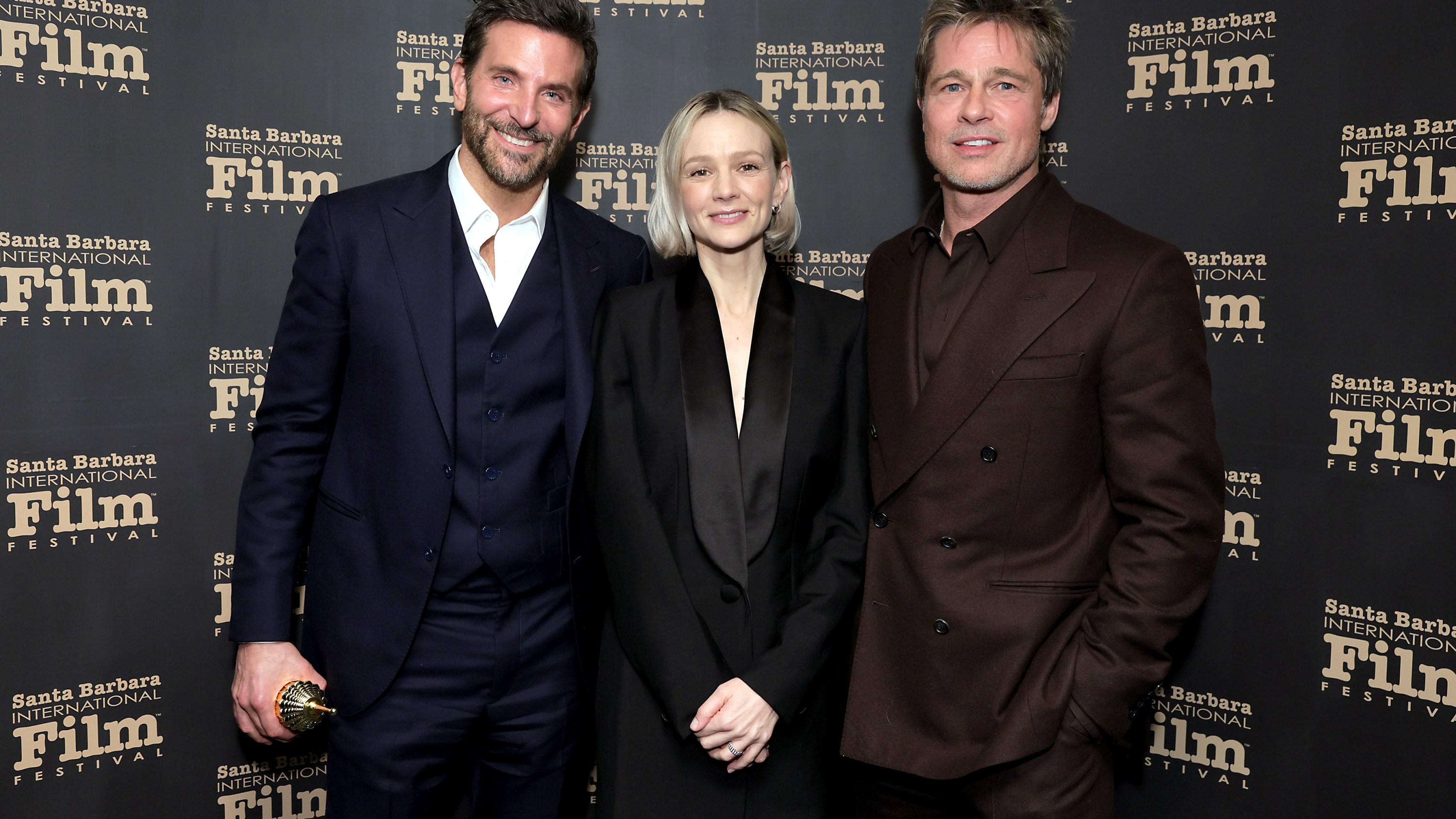 SANTA BARBARA, CALIFORNIA - FEBRUARY 08: (L-R) Honoree Bradley Cooper, Carey Mulligan, and Brad Pitt pose with the Outstanding Performer of the Year Award during the 39th Annual Santa Barbara International Film Festival at The Arlington Theatre on February 08, 2024 in Santa Barbara, California. (Photo by Rebecca Sapp/Getty Images for SBIFF)