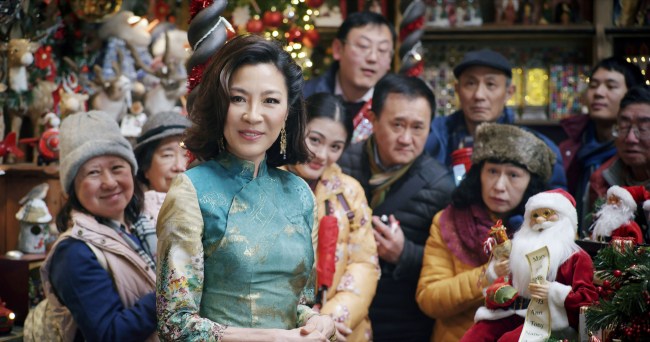 LAST CHRISTMAS, foreground: Michelle Yeoh, 2019. © Universal / courtesy Everett Collection