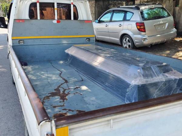 Parientes retiraron el cuerpo este sábado en San Pedro Sula.