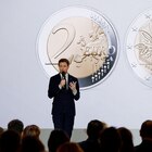 French minister for European affairs Clement Beaune presents a new two-Euro-coin marking the French Presidency of the Council of the European Union during a press conference on France assuming EU presidency, in Paris, on December 9, 2021. (Photo by Ludovic MARIN / POOL / AFP)
