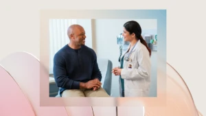 A decorative image of a doctor talking to a patient