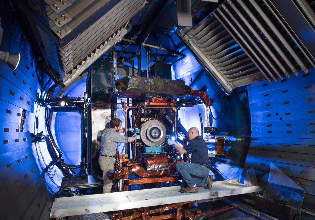 Engineers working on a machine