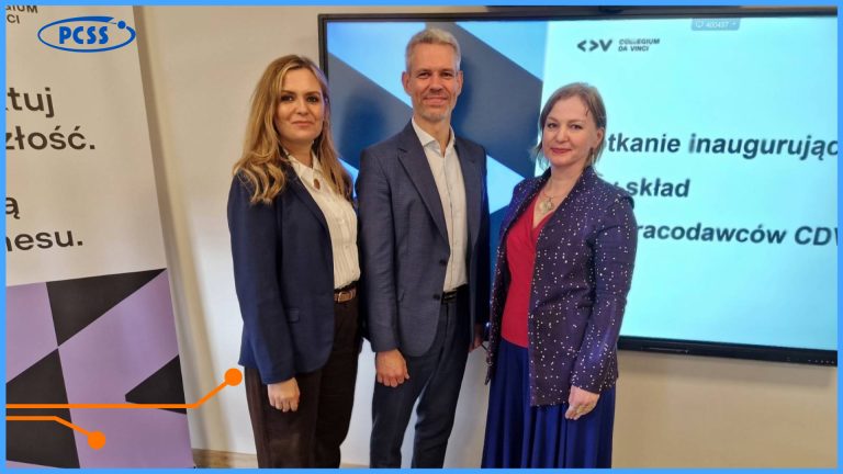 Three people stand in front of a banner with the PCSS logo and a screen displaying the CV logo during the inauguration of the CDV Employers' Council. A woman in a blue suit, a man in a gray suit in the center, and a woman in a red dress and jacket on the right.