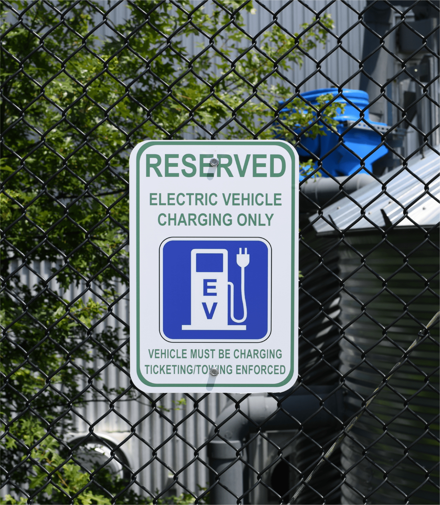 Image of reserved sign for electric charging vehicles. 