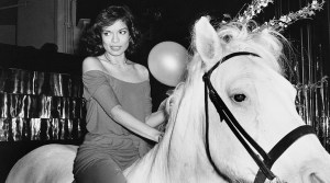 Bianca Jagger on a white horse that happened to be inside Studio 54 on her birthday in 1977.  This iconic photo was taken by Rose Hartman, subject of Otis Mass' documentary The Incomparable Rose Hartman, screening at the 2016 Bentonville Film Festival.  PHOTO CREDIT: Rose Hartman / The Artists Company