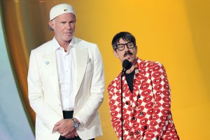 LOS ANGELES, CALIFORNIA - FEBRUARY 02: (FOR EDITORIAL USE ONLY) (L-R) Chad Smith and Anthony Kiedis of the Red Hot Chili Peppers present the Best Pop Vocal Album award onstage during the 67th GRAMMY Awards at Crypto.com Arena on February 02, 2025 in Los Angeles, California. (Photo by Amy Sussman/Getty Images)