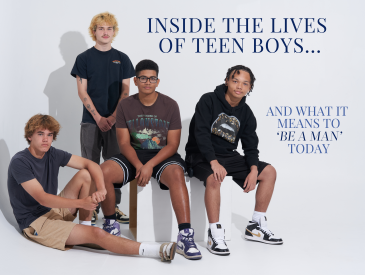 Group of teen boys posing for a photo.