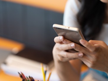 Teenage girl using phone