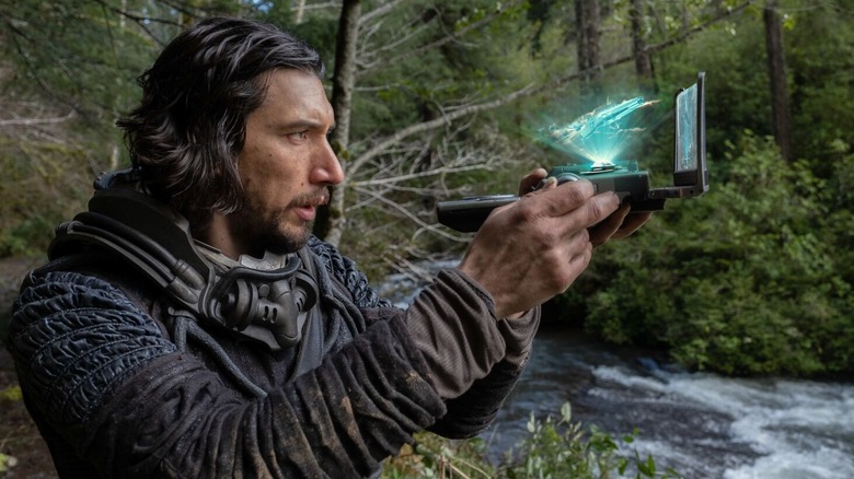 65 Adam Driver uses an advanced map