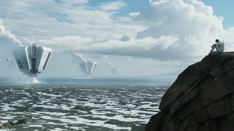 Jack watches hydrothermal platforms from cliff