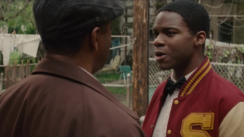 Troy Maxson and Cory facing off in their backyard in Fences